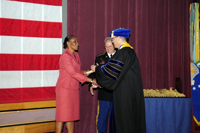 CSM (ret) Jones hands out diplomas to USASMA college grads