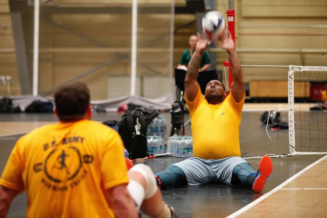 Staff Sgt. Isaac Rios practices sitting volleyball during the 2014 U.S. Army Warrior Trials