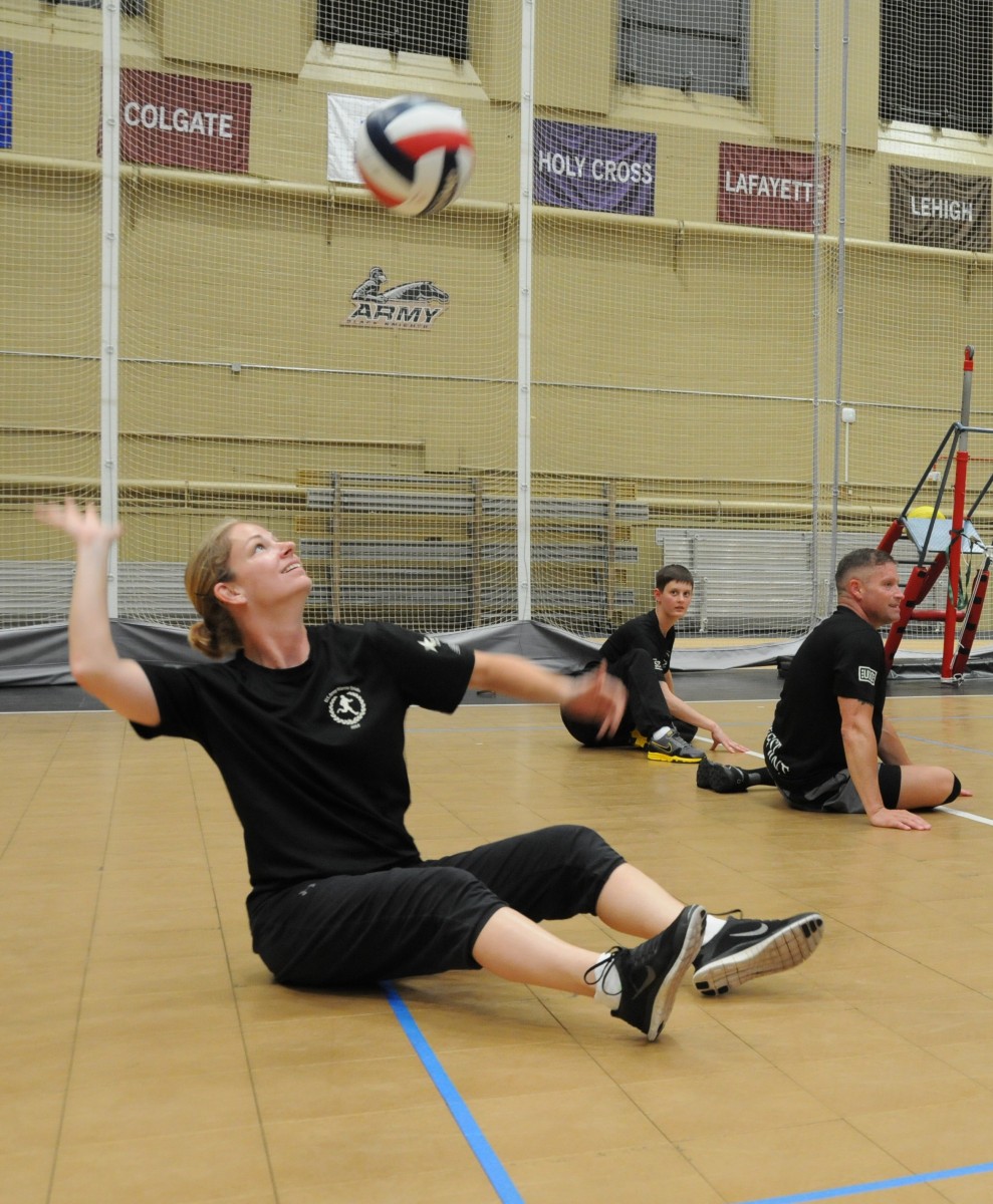 Sgt. 1st Class Sam Goldenstein practices sitting volleyball during the