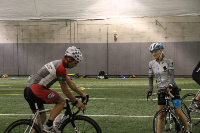Cycling coach trains 2014 U.S. Army Warrior Trials athlete techniques on balancing and turns
