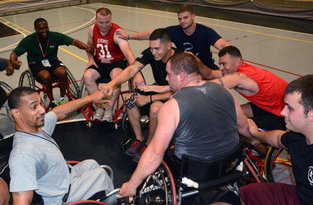 Wheelchair basketball coach fires up his team during training at the 2014 Warrior Trials 