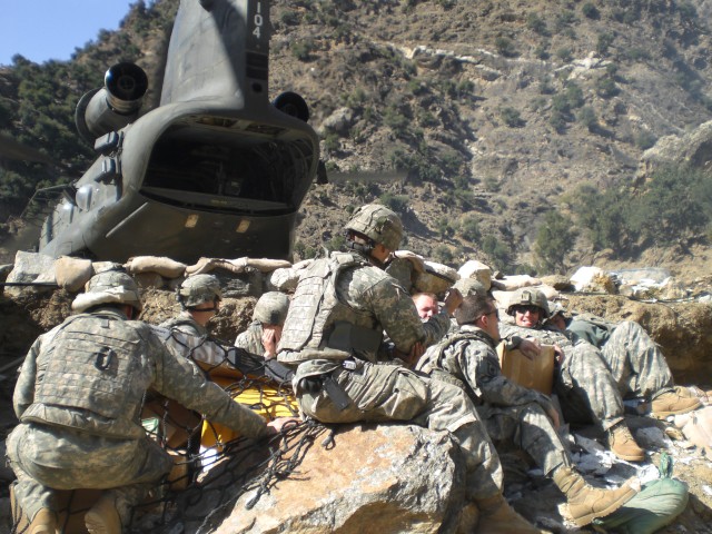 2nd Platoon, Chosen Company unpacking supplies at COP Bella