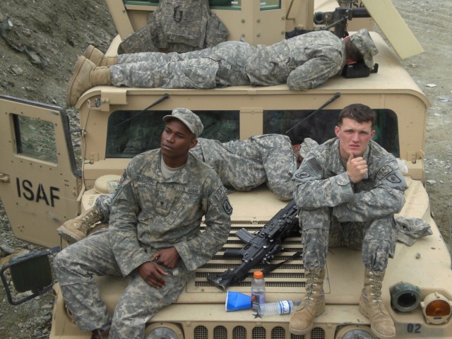Spc. Laquan Borden and Cpl. Jason D. Hovater take break