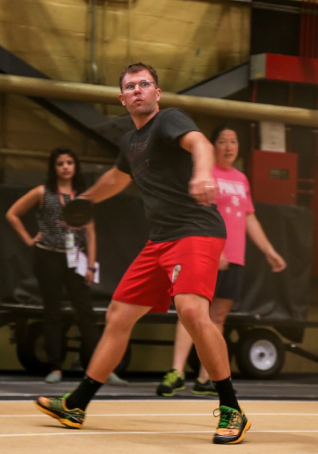 Marine Cpl. Kyle Kohnke trains for the shot put and discus events at the 2014 U.S. Army Warrior Trials