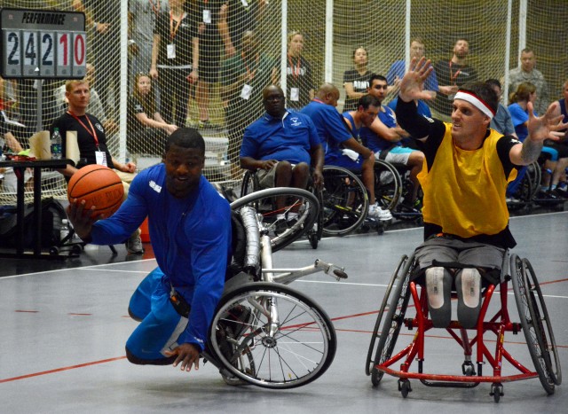 Army athlete grabs the ball from his Air Force opponent during the 2014 Warrior Trials