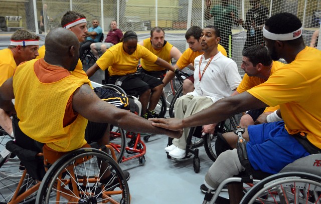 Army Wheelchair basketball team talkes strategy before the semi-finals at the 2014 Warrior Trials
