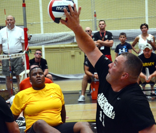 Sgt. Sean Hook's power-driven spike contributes to an Army victory June 18, 2014