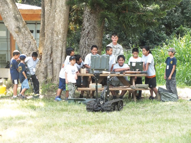 Cub Scouts build character, earn badges on Area X