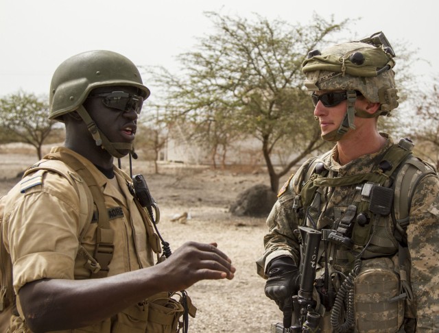 U.S. Soldiers participate in Mock Food Riot during Western Accord 14