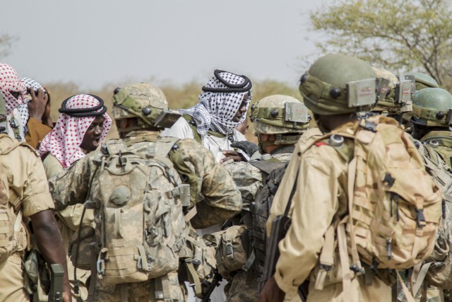 U.S. Soldiers participate in Mock Food Riot during Western Accord 14