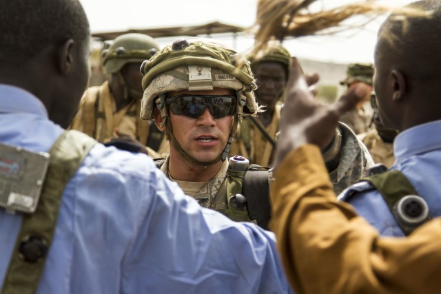 U.S. Soldiers participate in Mock Food Riot during Western Accord 14