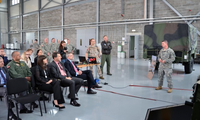 Capt. Mark Wurth briefs Latvian Minister of Defense and U.S. Ambasssodor