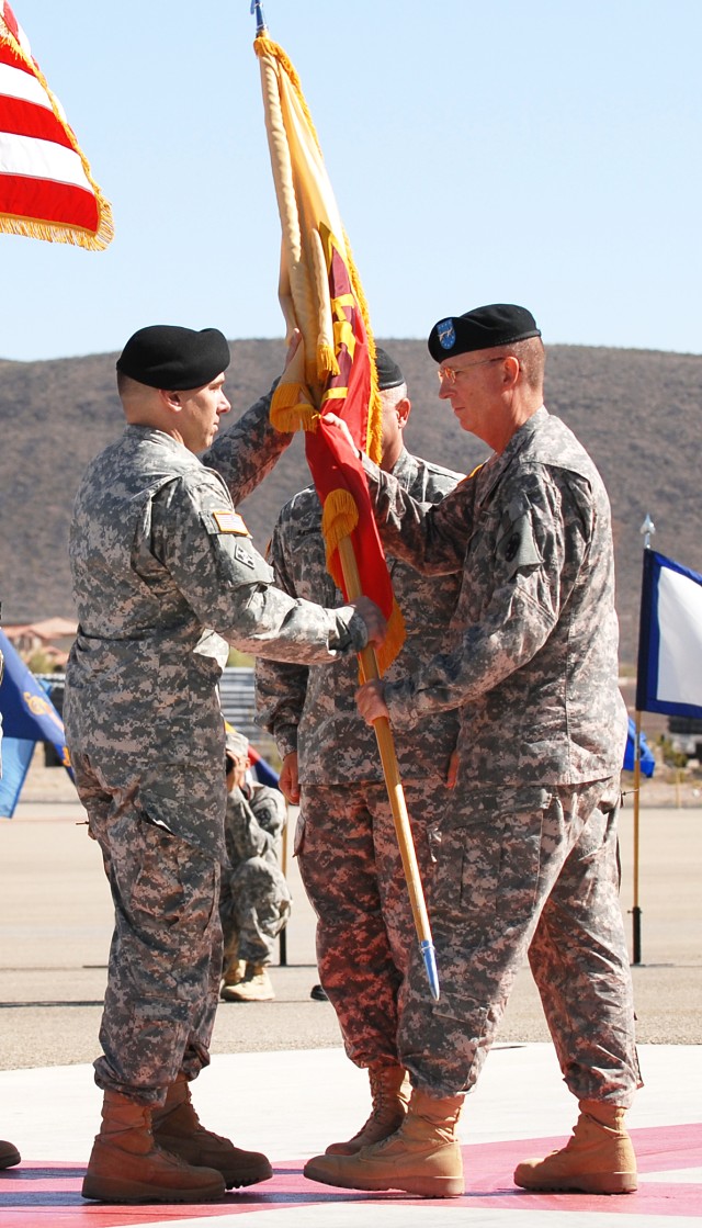 COL Ruedi receives brigade colors from MG Martin