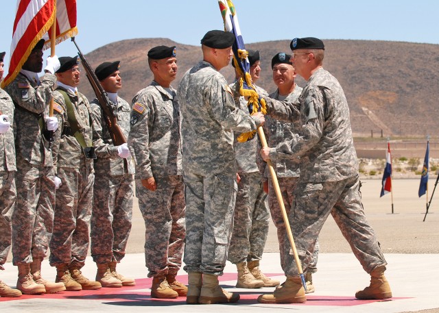 COL Broadwater receives unit colors from MG Martin