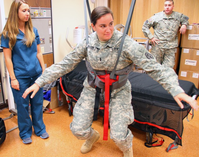 Staff demonstrates lift system during training