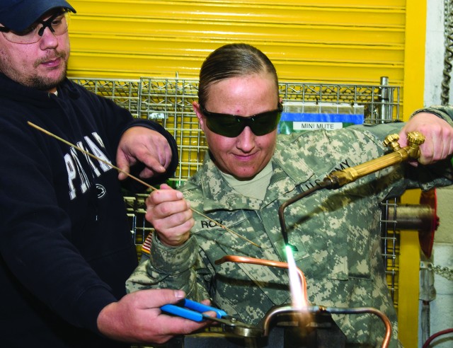 Technicians, National Guard work side-by-side to hone skills