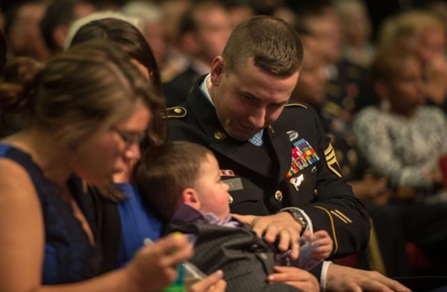 Staff Sgt. Ryan Pitts plays with his son