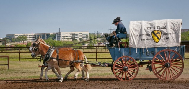 1st Cavalry Division Horse Cav. rides past III Corps headquarters