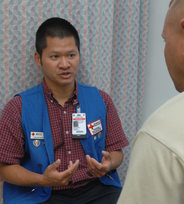 Dr. Nguyen talks with a patient