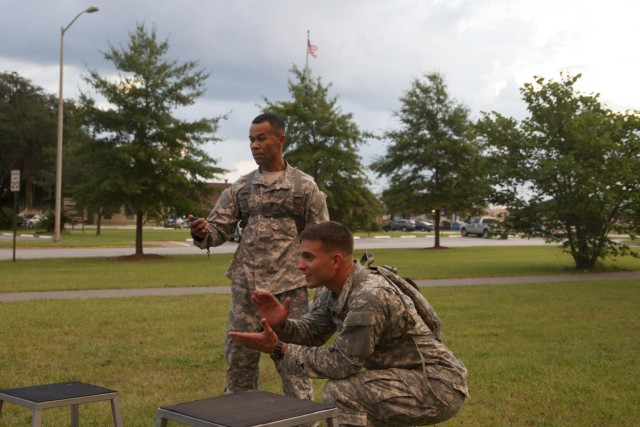 Commander's physical challenge builds teams, lifts morale