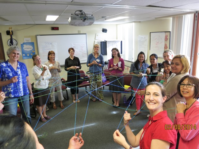 Tripler staff perform Centering group exercise