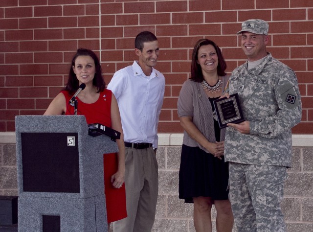 Scialdo brother and sisters with Staff Sgt. Matt Loebs