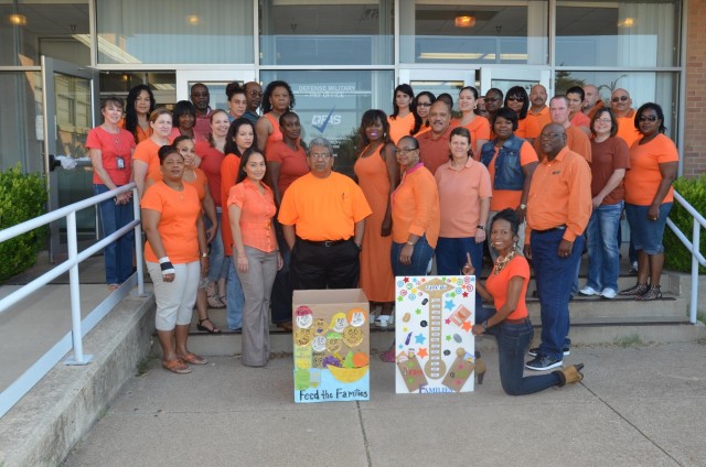 DFAS employees triple donation goal
