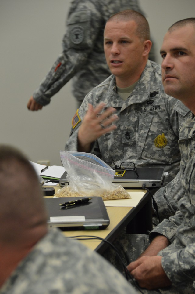 Sgt. 1st Class Peter Trompeter interacts during a resiliency class