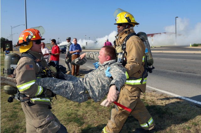 Firemen carry