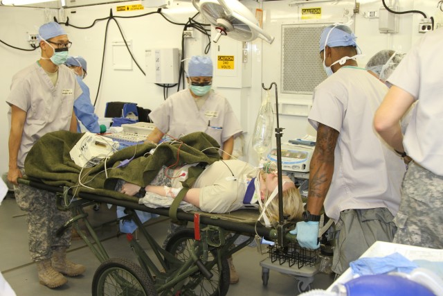 Medical Staff of 121st Combat Support Hospital established a field operating room during the mass casualty exercise.