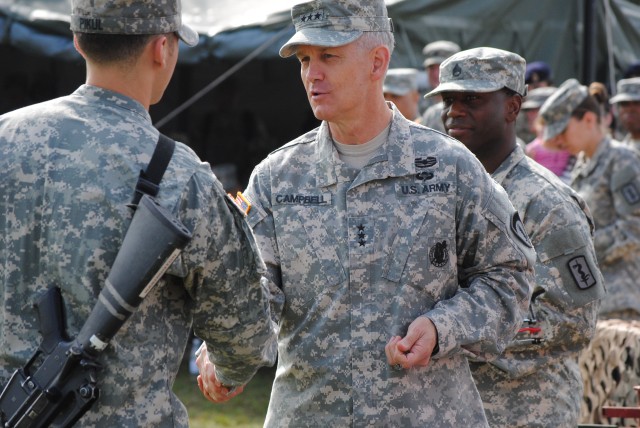 Lt. Gen. Cambpell Recognizes the Candidate With the Fastest Road March Time