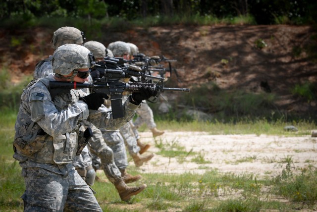 Paratroopers walk toward their targets