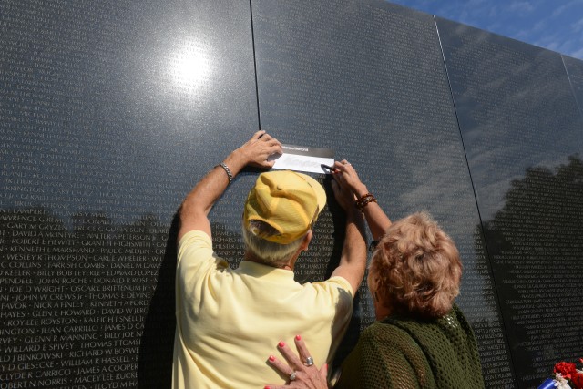 Family of MOH recipient Sloat makes solemn visit to Vietnam Wall