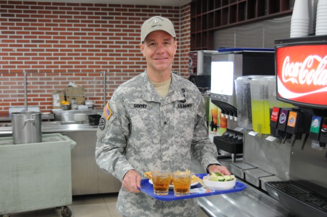 Eighth Army Deputy Commanding General (Sustainment) Brig. Gen. Chris Gentry has lunch at Honors Cafe Sept. 17, 2014.