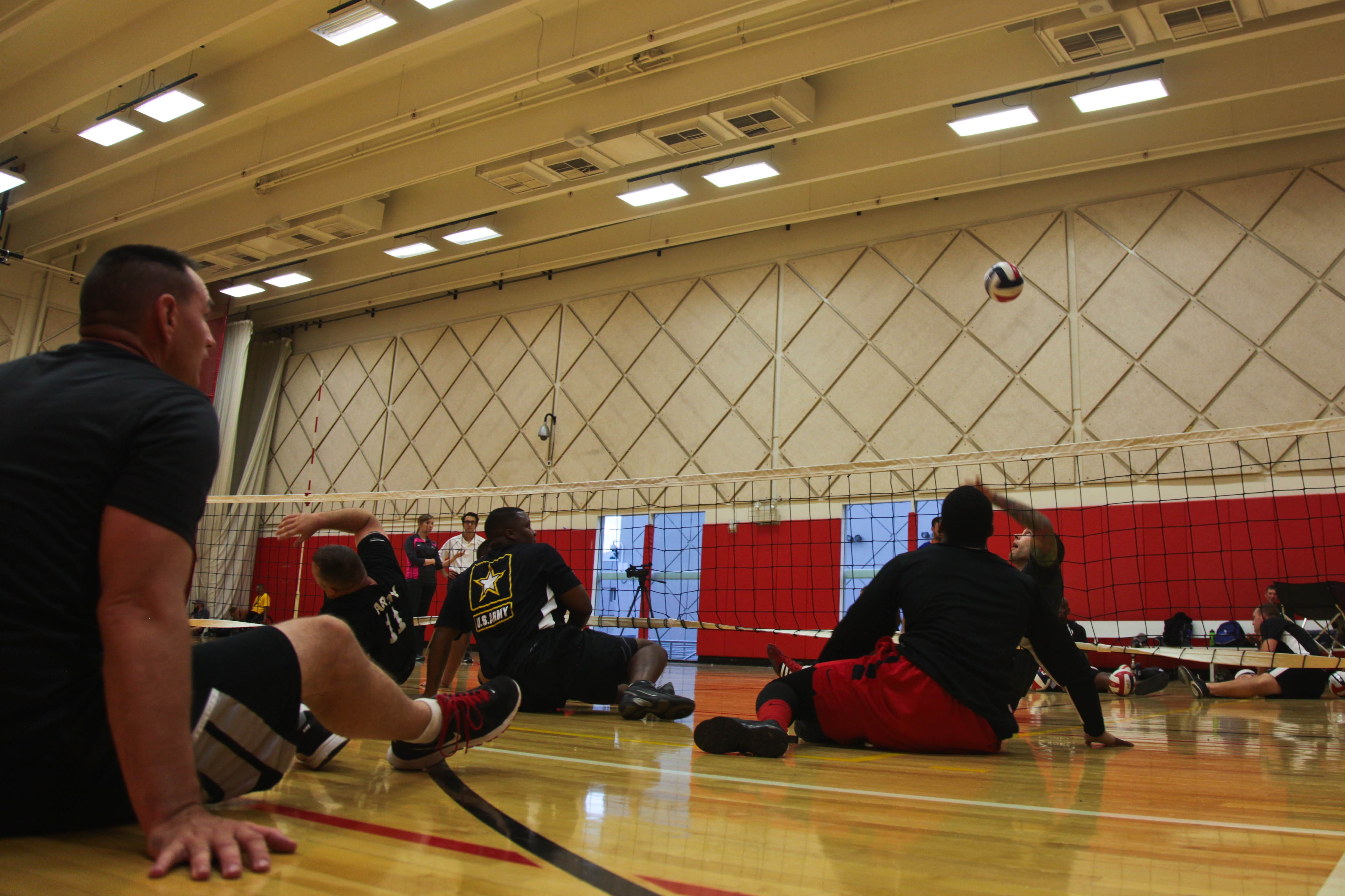 Team Army practices sitting volleyball during training for the 2014