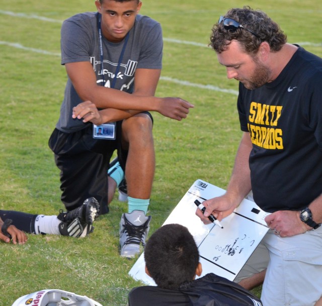 Coach Whittenburg draws up a play
