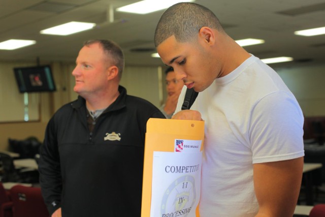 Staff Sgt. Munoz views packet