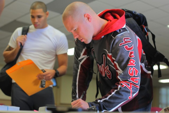 Spc. Andersen signs into the Best Warrior Competition