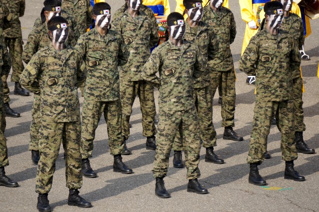 Republic of Korea Soldiers prepare to perform at the 2014 RoK Ground Forces Festival, Gyeryong Korea Oct. 2, 2014