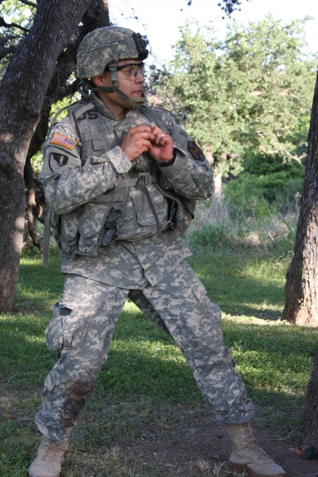 Sgt. Martinez prepares to throw grenade