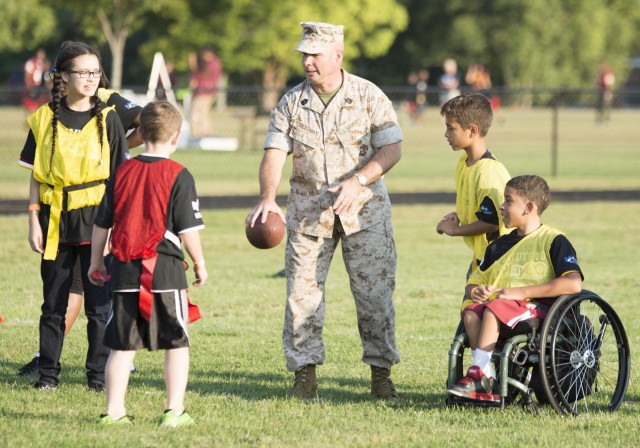 Redskins, kids Play 60 at Belvoir