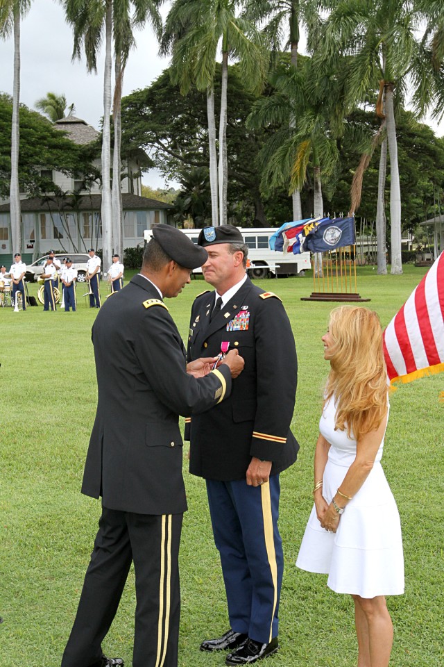 Col. Richard J. Kramer's receives retirement pin