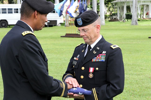 Col. Jacobson receives retirement flag a Celebration of Service