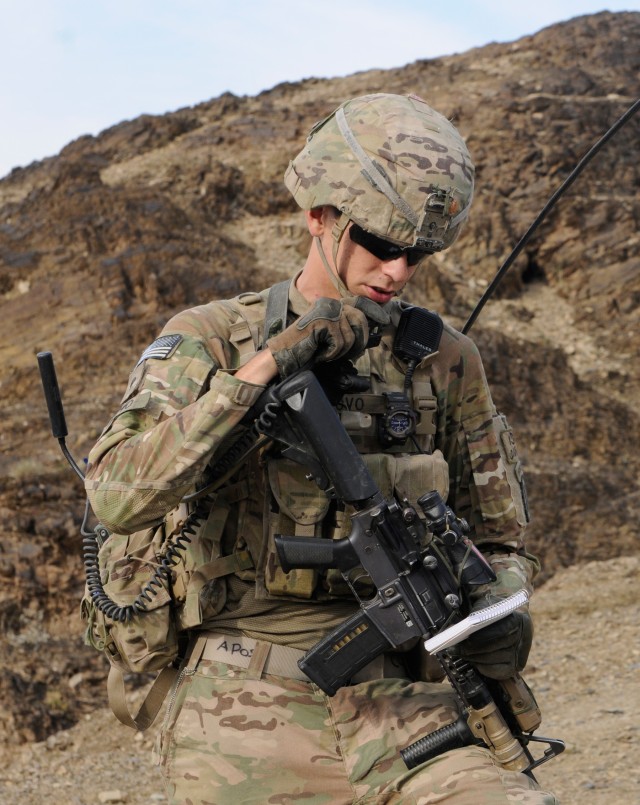 Soldier uses Rifleman Radio and Nett Warrior at the Army's Capability Set (CS) 13 at Nangalam Base, Afghanistan.