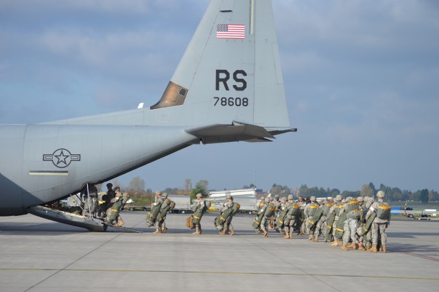 -Sky Soldiers parachute into Romania for rapid deployment exercise - Paratroopers loading up
