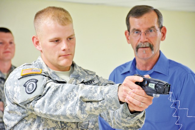 MPs 'take the ride' during stun gun training