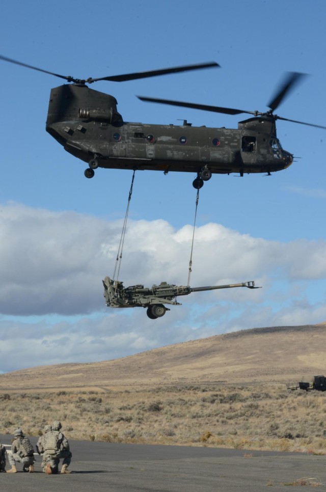 Arrowhead howitzers, crews take to the sky at Yakima