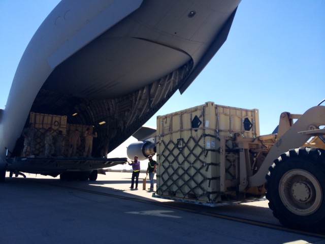 1st Armored Division Combat Aviation Brigade load up for Africa