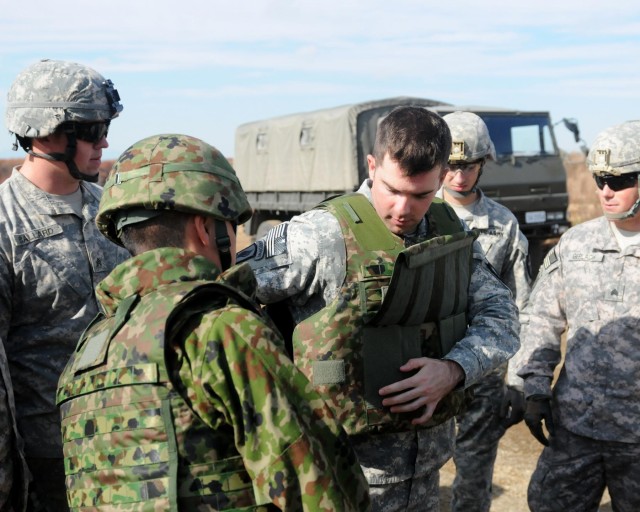 US and Japanese forces share marksmanship skills during Orient Shield 14