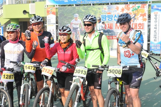 Biking for the alliance at the 8th Annual Wangbang International Mountain Bike Match.